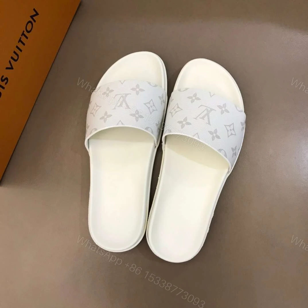 View 2 of LOUIS VUITTON WHITE MONOGRAM SLIDES – LVS43