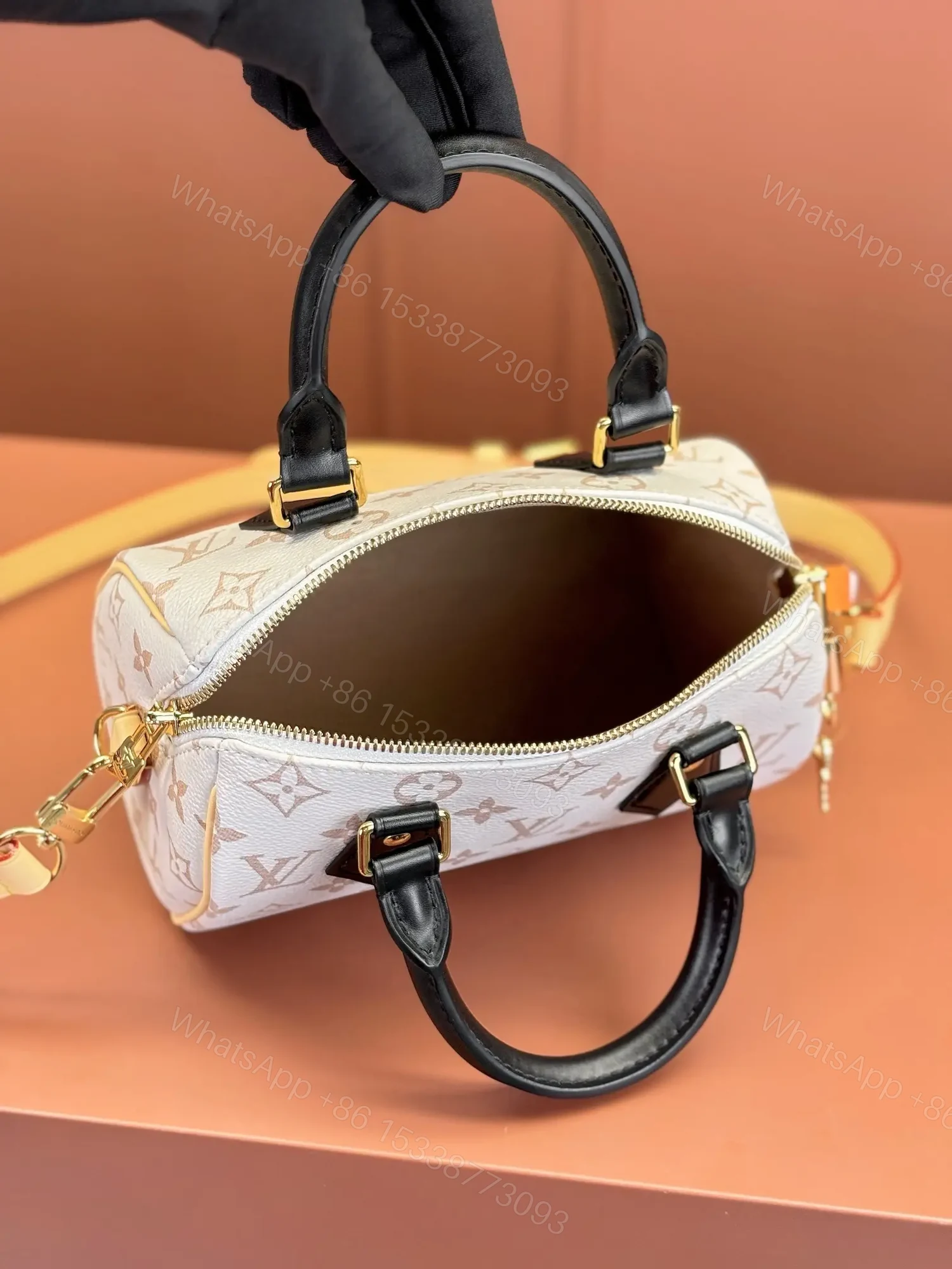 View 3 of Louis Vuitton Monogram Dune Speedy Bandoulière 20