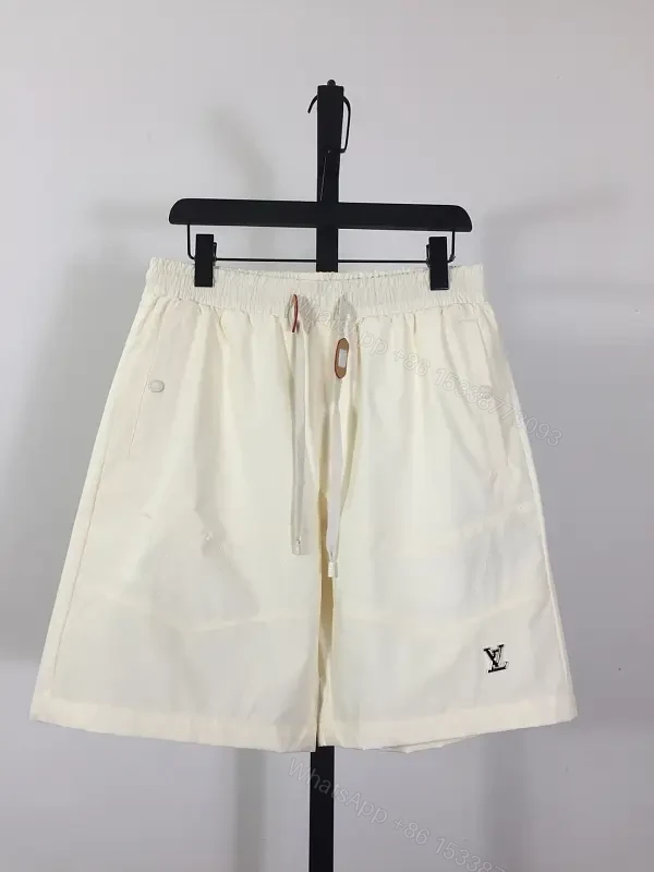 Cream Canvas Shorts - Relaxed Style, Drawstring Waist, LV Logo — view 1