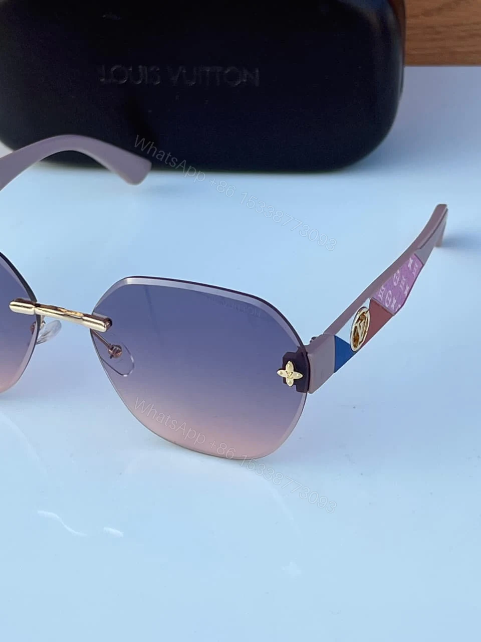 View 3 of Louis Vuitton Rimless Butterfly Sunglasses Purple-Pink