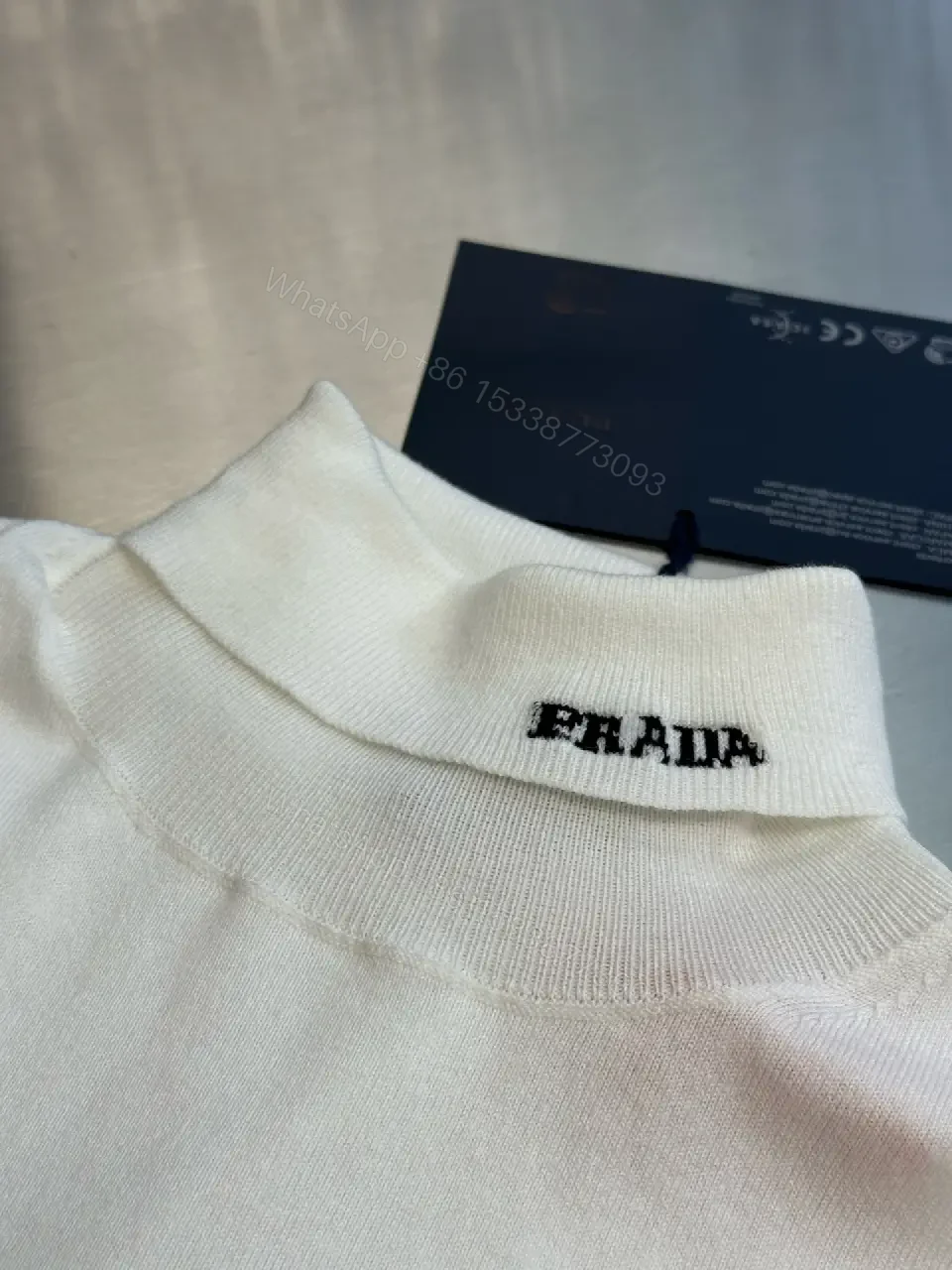 View 3 of Off-White Knit Roll-Neck Tunic: Luxe Casual Elegance