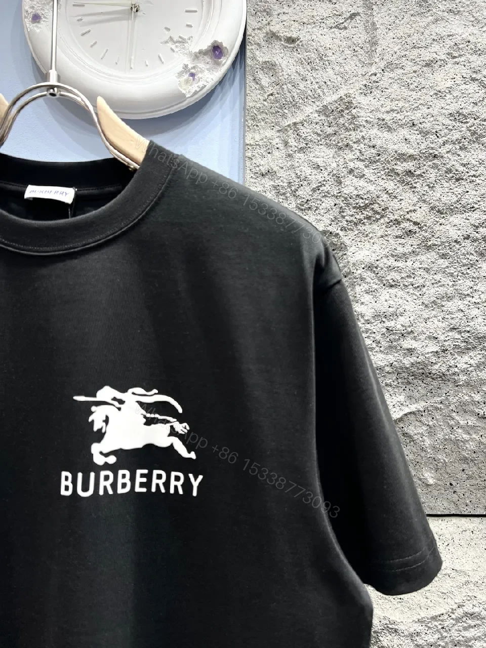 View 10 of Black Cotton Logo Tee: Refined Streetwear Essential