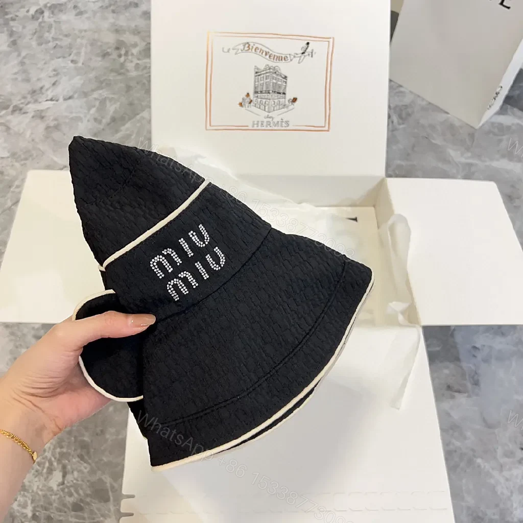 View 6 of Structured Black Straw Bucket Hat — Crystal Logo Accent, All-Season Style