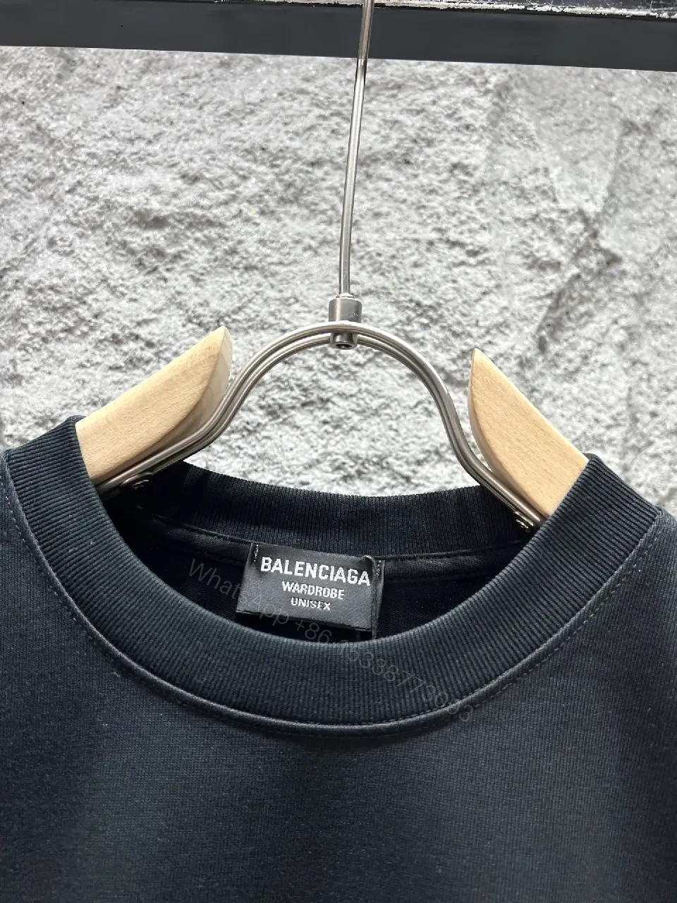 View 9 of Black Cotton Crewneck Tee with Subtle Red Logo Embroidery