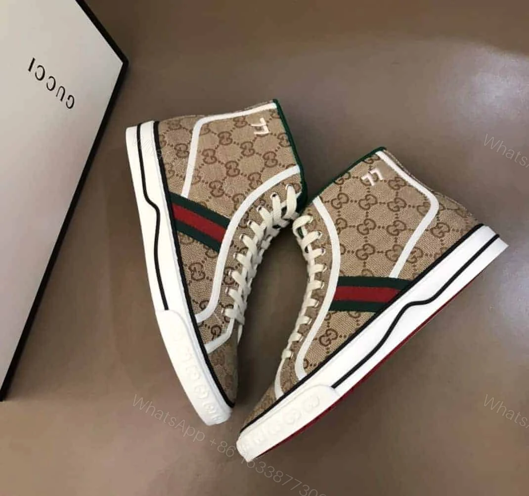 View 2 of GUCCI TENNIS 1977 HIGH-TOP SNEAKERS IN BEIGE AND EBONY GG CANVAS – GC100
