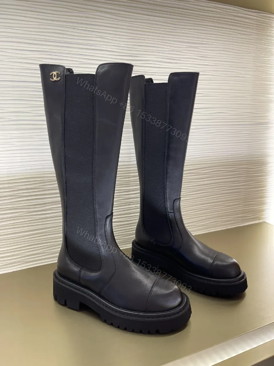View 6 of Chic Knee-High Boots with Signature Hardware Leather-Luxe Style
