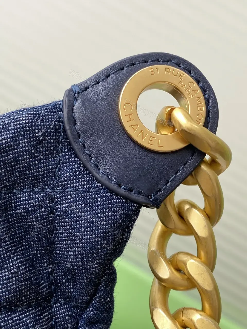 View 5 of Denim-Texture Luxe Shoulder Bag with Gold Hardware