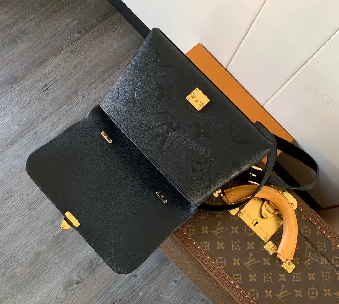 View 8 of LV MADELEINE 30 IN BLACK MIX WHITE MONOGRAM CALFSKIN EMBOSSED LOGO