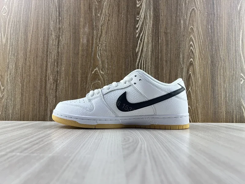 View 6 of Minimal White & Black Nike-Style Sneaker with Gum Sole