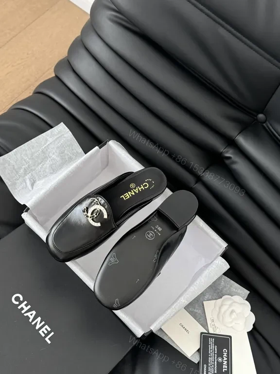 View 9 of Chanel-Inspired Black Leather Slip-Ons with Signature Hardware