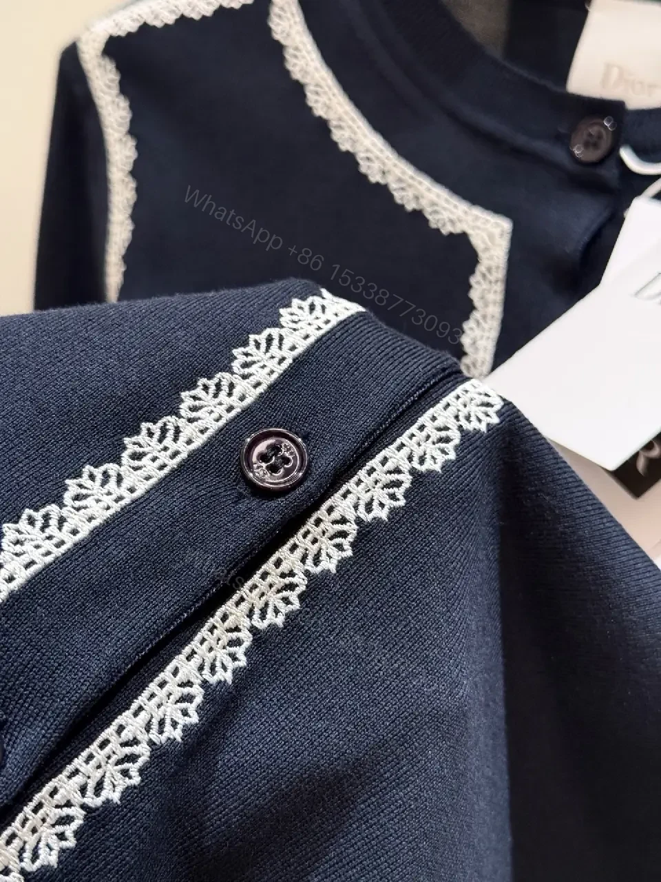 View 2 of Navy Knit Cardigan: White Piping, Modern Contrast, All-Day Comfort