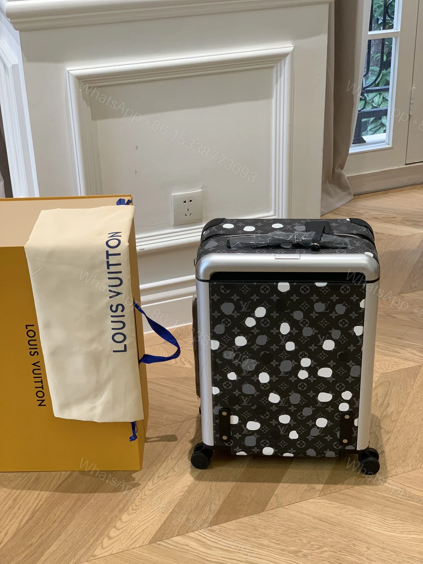 View 3 of Louis Vuitton X Yayoi Kusama Horizon 55 Suitcase Grained Leather Black 55Cm