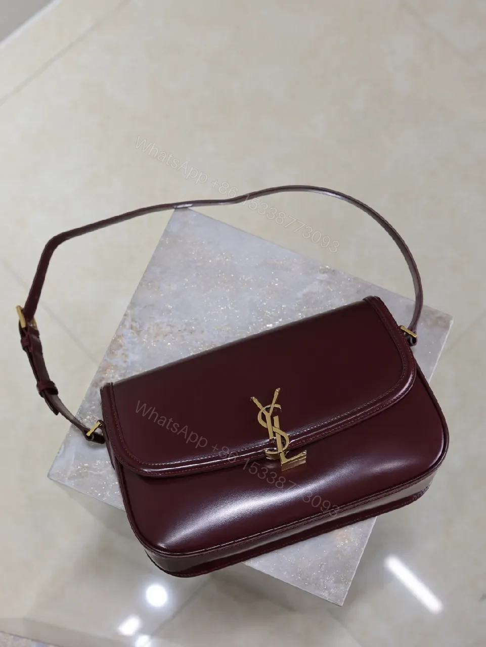 View 2 of Structured Burgundy Leather Crossbody: Gold Logo, Modern Chic