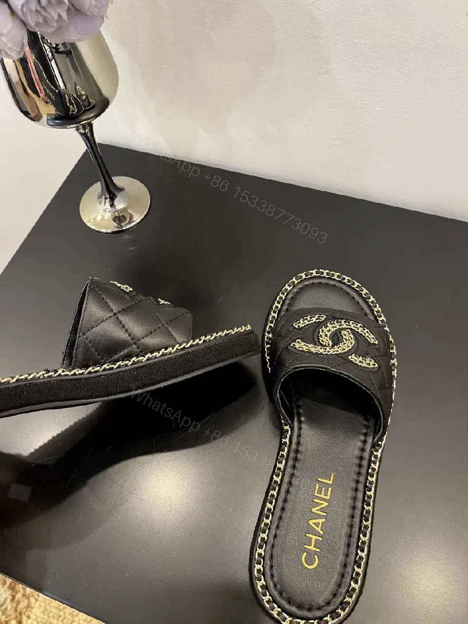 View 3 of Black Leather Slip-Ons with Chain Detailing Sandals