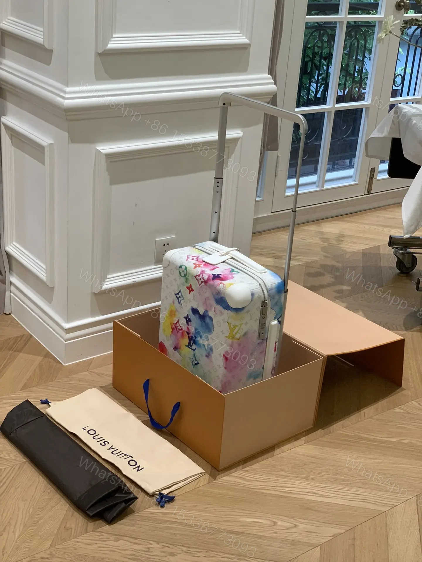 View 5 of Louis Vuitton Horizon 55 suitcase in the Watercolor Multicolor