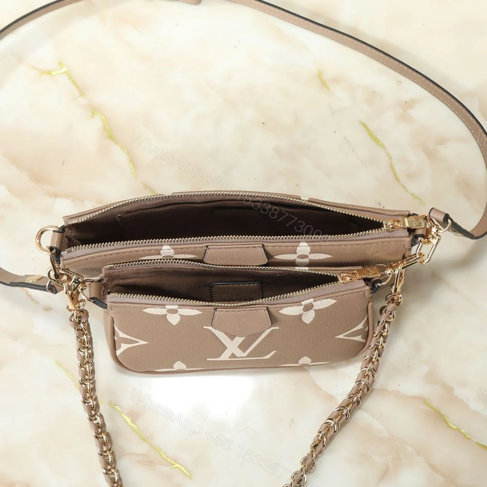 View 5 of Louis Vuitton Multi Pochette Accessoires Monogram Empreinte Greige 25Cm