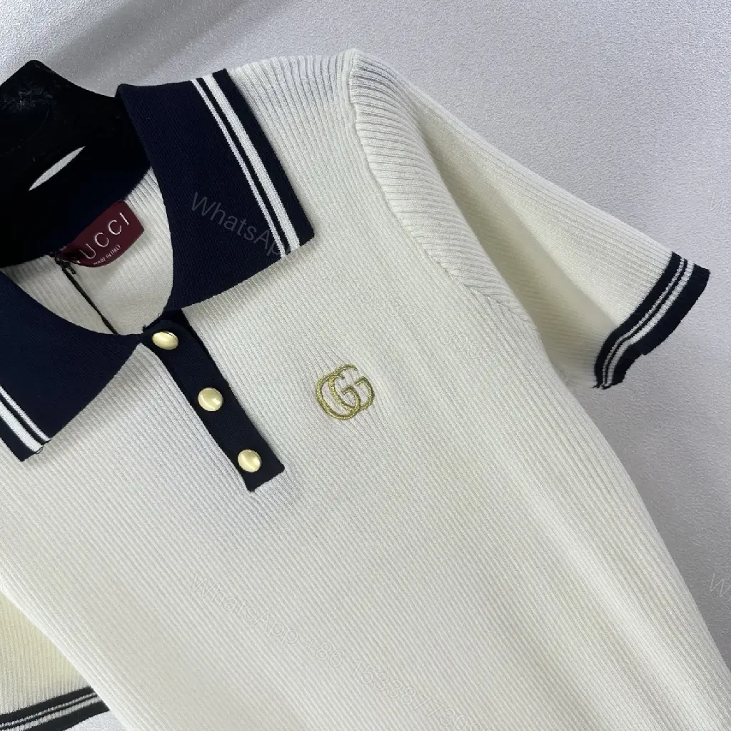 View 4 of Cream/Navy Ribbed Polo Shirt with Gold Accents