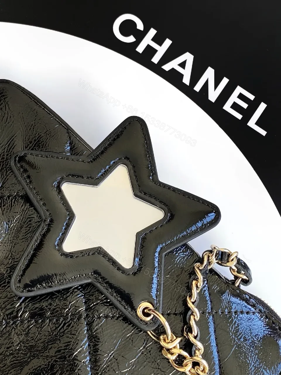 View 2 of Black Quilted Crossbody Bag with Gold Chain