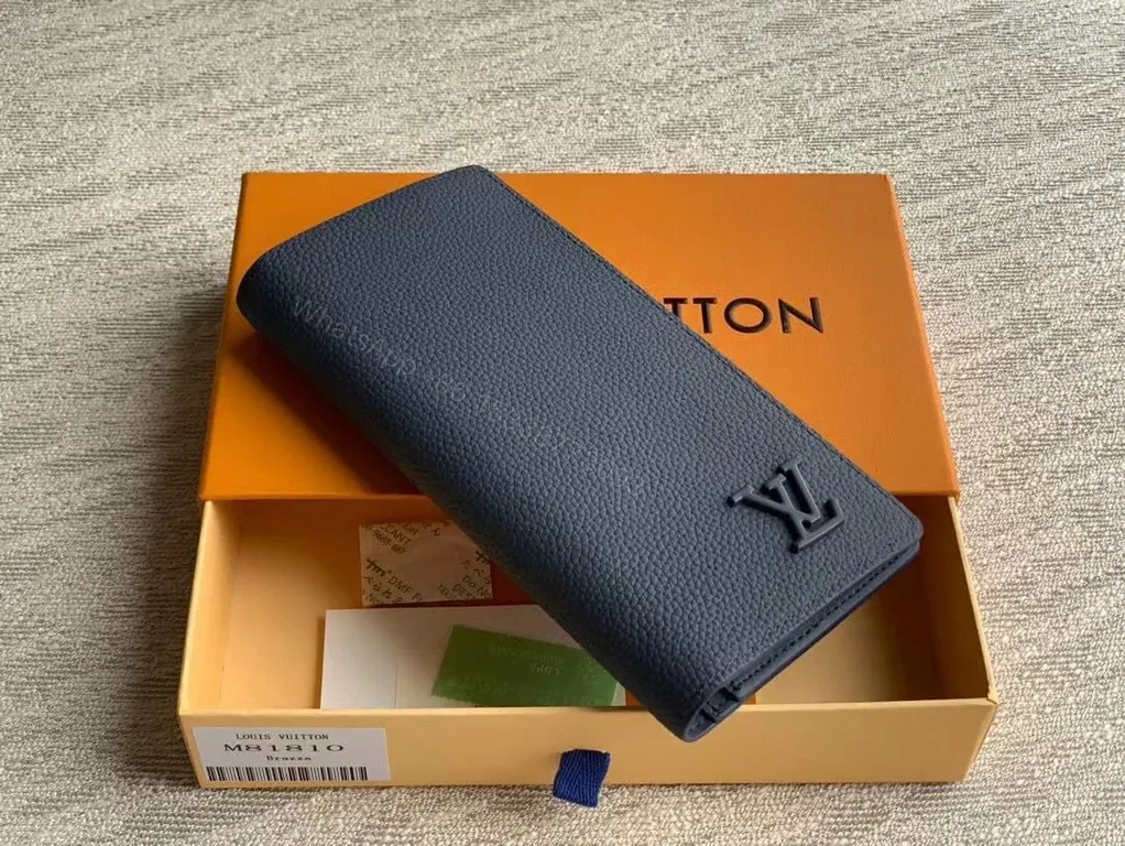 Navy Pebbled Calfskin Long Wallet â€“ Subtle LV Luxe — view 1