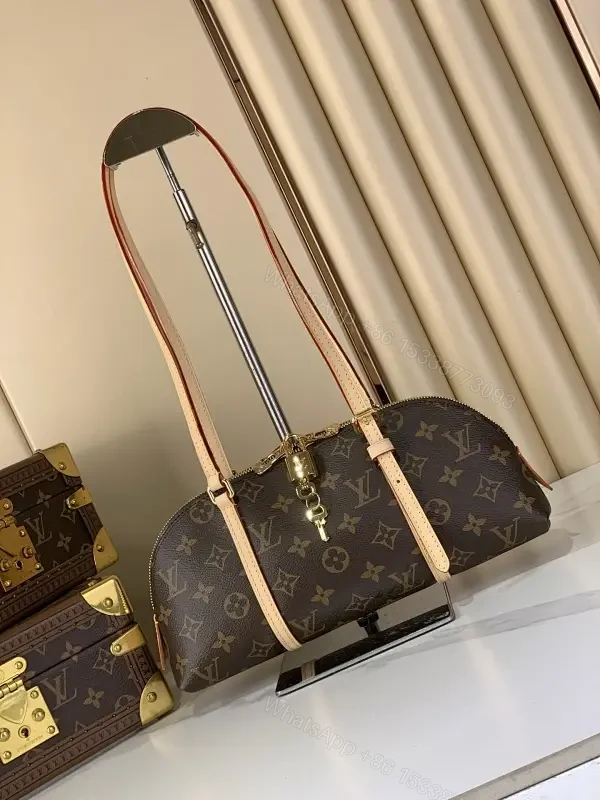 Chic Monogram Barrel Bag: Structured, Luxurious Carryall — view 1