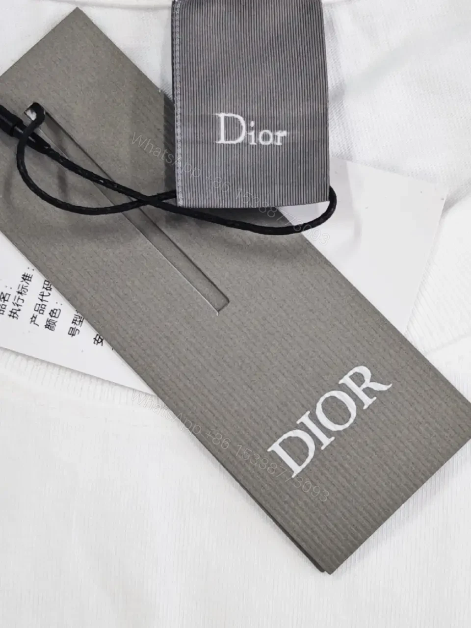 View 9 of Minimalist Luxe Tee: White Cotton, Delicate Embroidery, Everyday Chic
