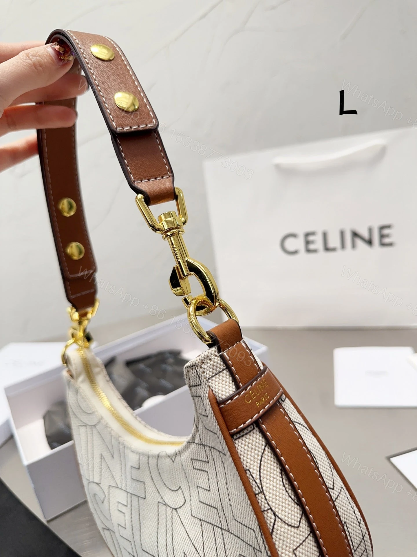 View 5 of CELINE MEDIUM AVA STRAP BAG IN TEXTILE WITH ALL OVER PRINT NATURAL 25CM 196922ERK02NT