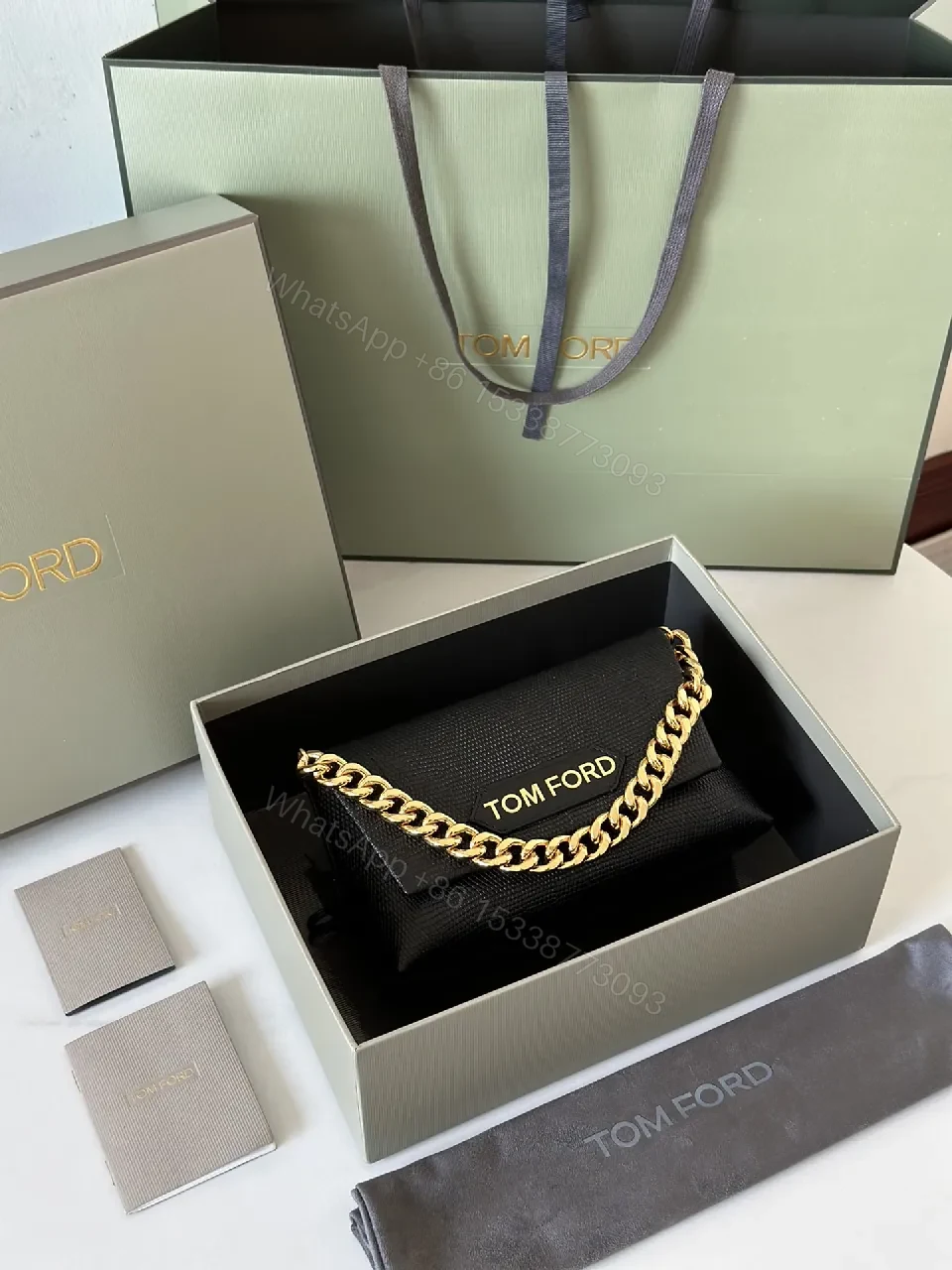 View 2 of Chic Black Leather Wallet with Gold Chain: Luxury, Compact