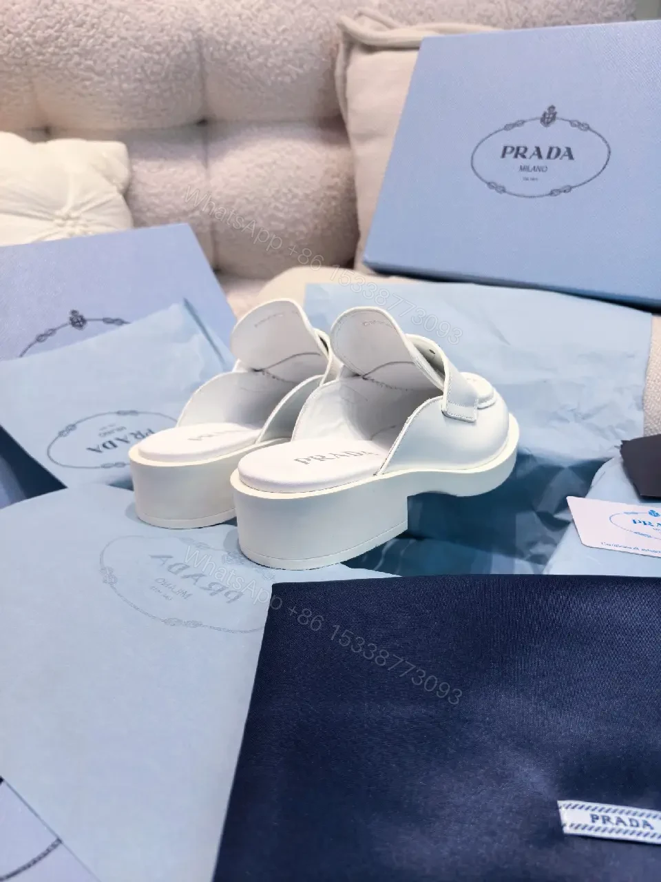 View 2 of White Leather Prada Slip-ons: Classic Padded Comfort Shoes