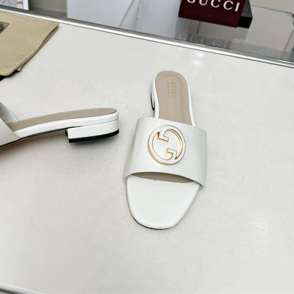 View 2 of GUCCI WOMEN ROUND INTERLOCKING G SANDAL IN WHITE