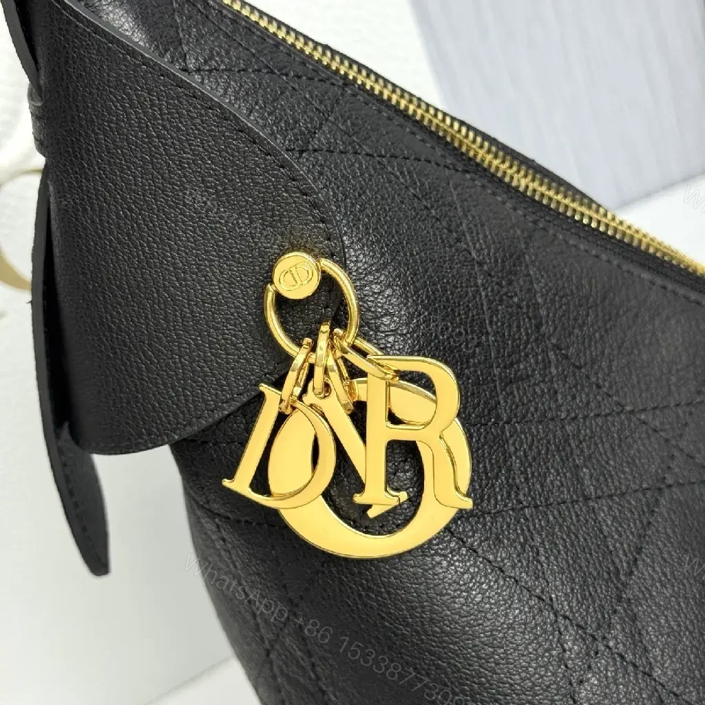 View 5 of Chic Black Leather Hobo with Gold Accents — Luxury Everyday Bag