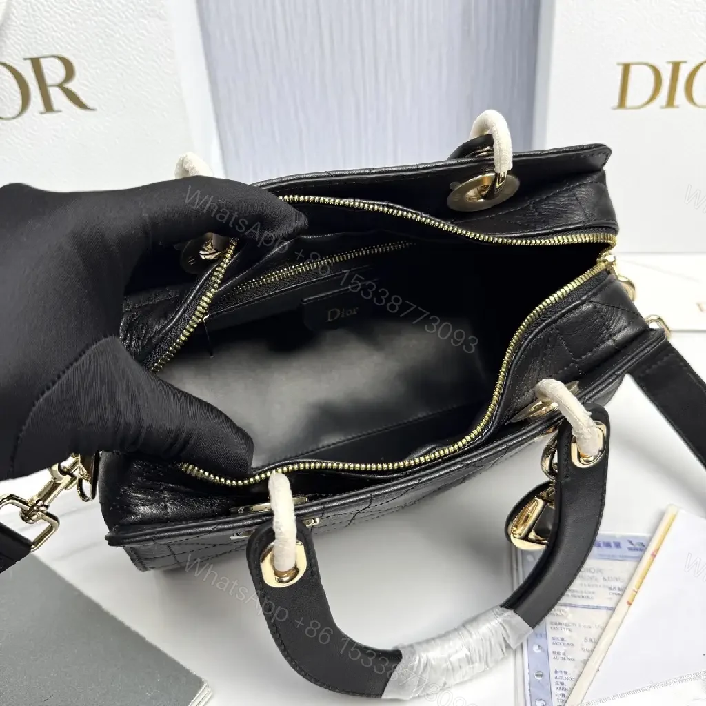 View 2 of Quilted Black Satchel: Gold Charm, Compact Luxury Bag