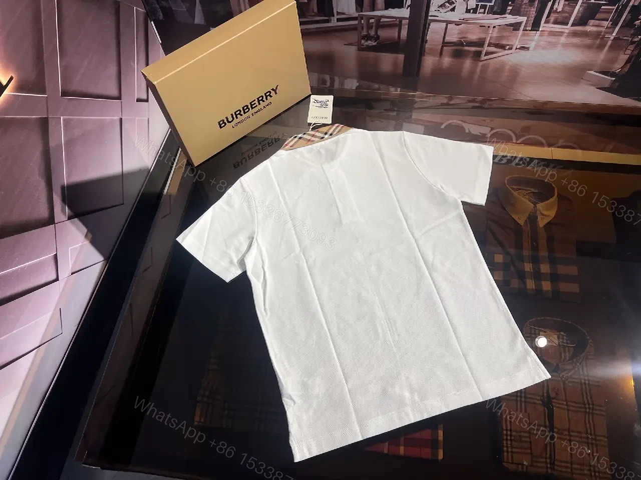 View 4 of White Piqué Polo with Signature Check Collar - Contemporary Luxury