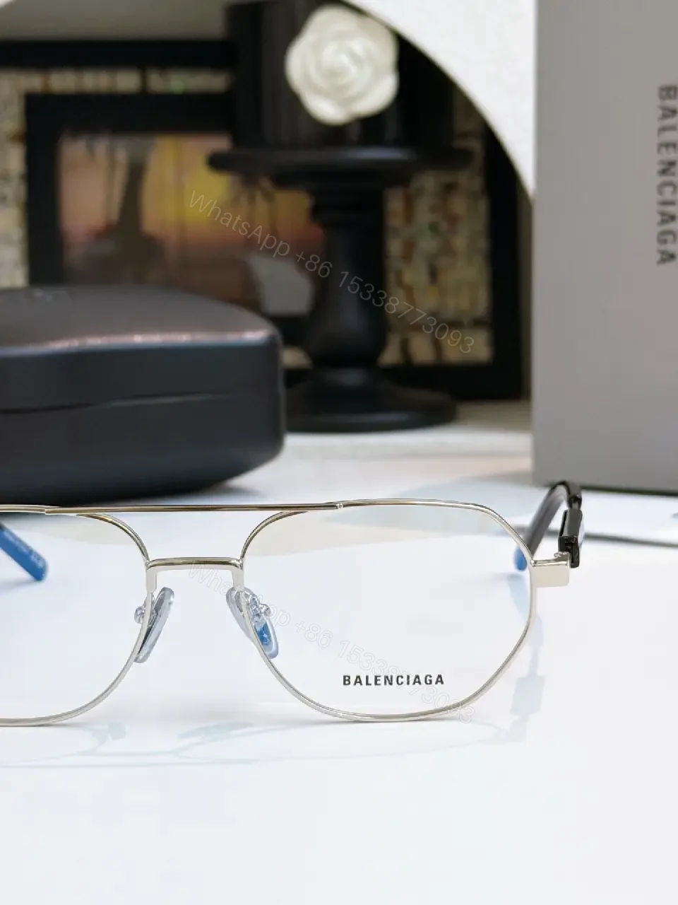 View 9 of Silver Metal Aviator Sunglasses: Luxe Slim Frames with Logo Detailing
