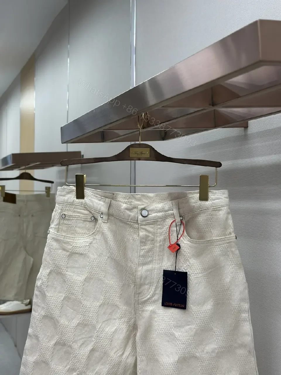 View 5 of Beige textured cotton-blend shorts with monogram-inspired print for everyday luxury