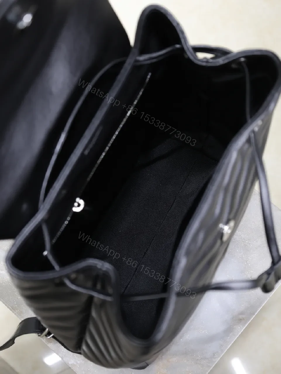 View 9 of Structured Quilted Backpack with Luxe Texture - City-Ready, Durable