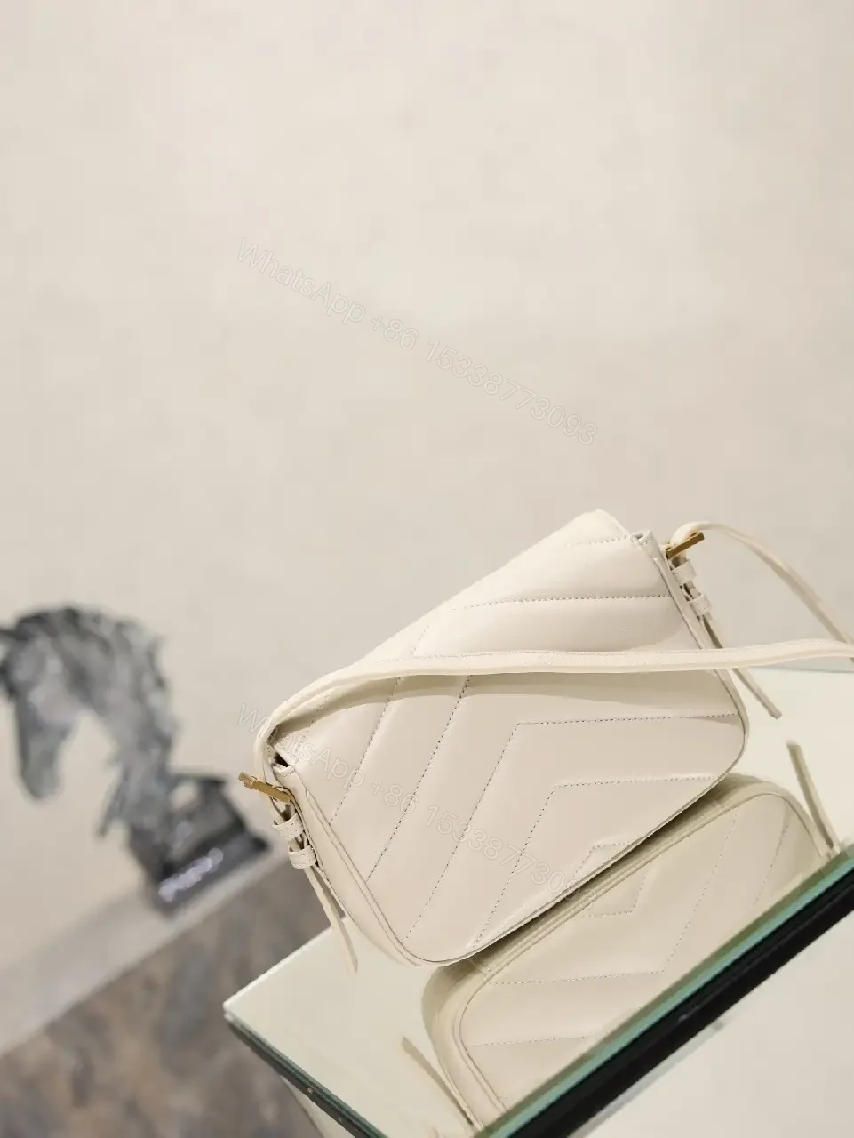 View 3 of Off-White Cream Leather Mini Crossbody Bag with Chevron Front Feature