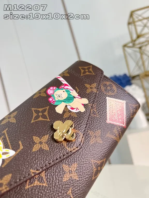 View 2 of Compact Monogram Wallet: Luxe Accent, Durable Canvas, Snap Closure