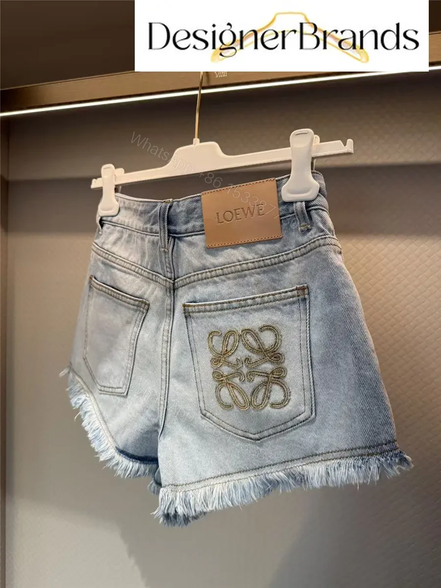 View 4 of LOEWE Paula Ibiza Anagram Embroidered Denim Shorts