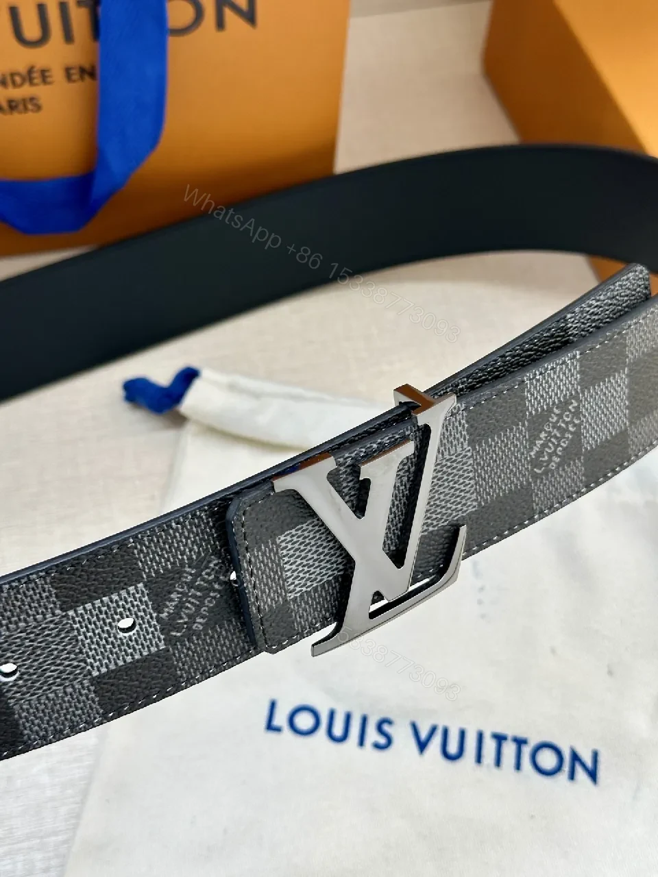 View 6 of Checkerboard Canvas Belt with Signature Buckle – Premium Modern Accessory
