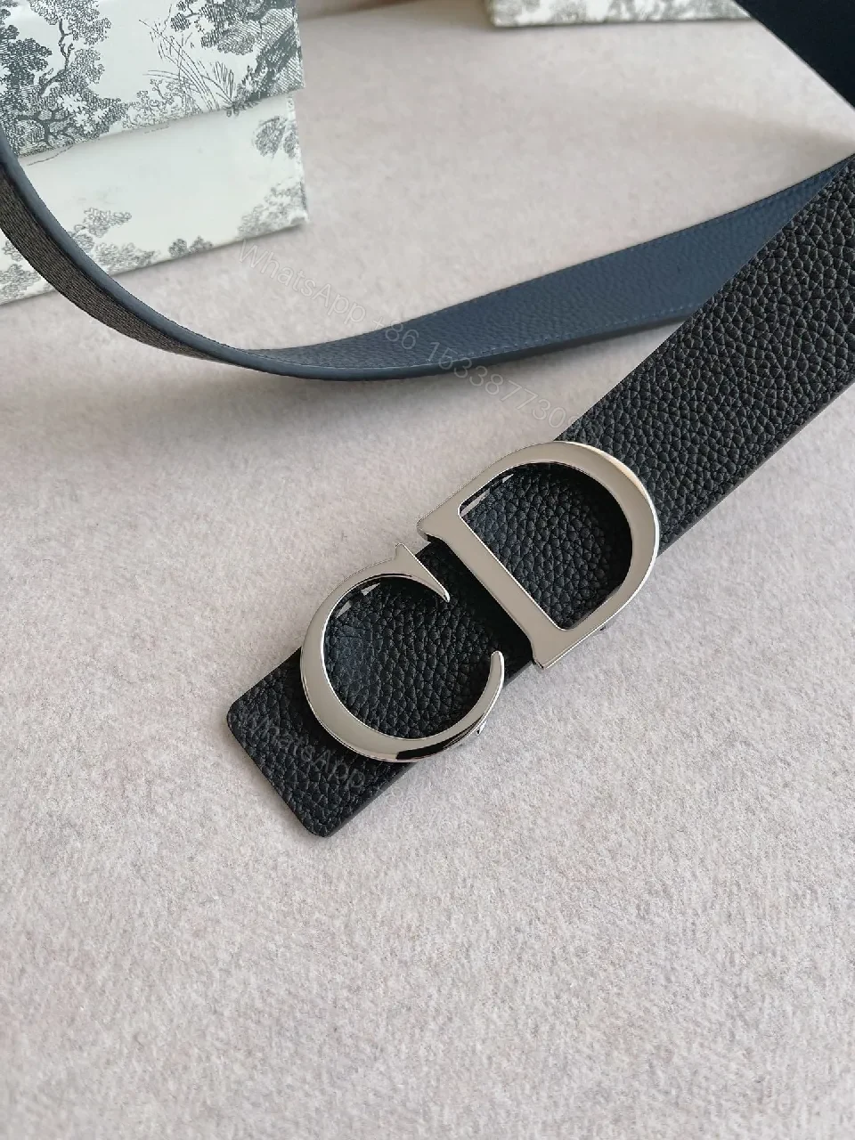 View 9 of Chic Black Leather Belt with Signature Buckle - Minimalist Luxury Belt