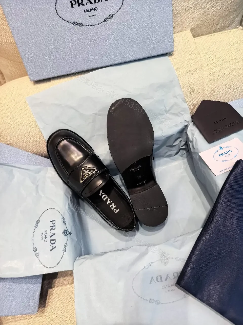 View 8 of Black Leather Prada Slippers with Logo Trim