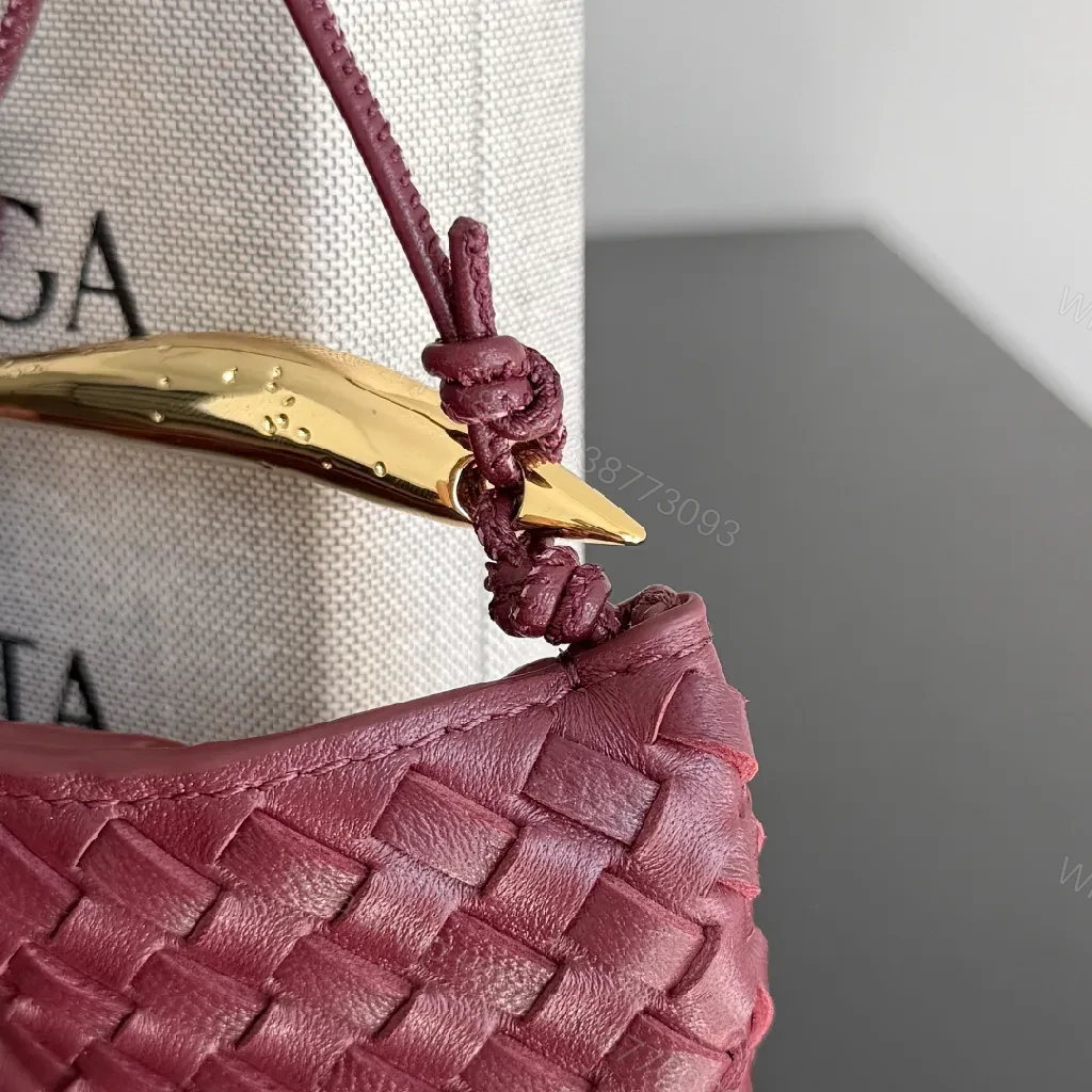 View 8 of Textured Plum Mini Bag: Handwoven Leather, Luxe Compact
