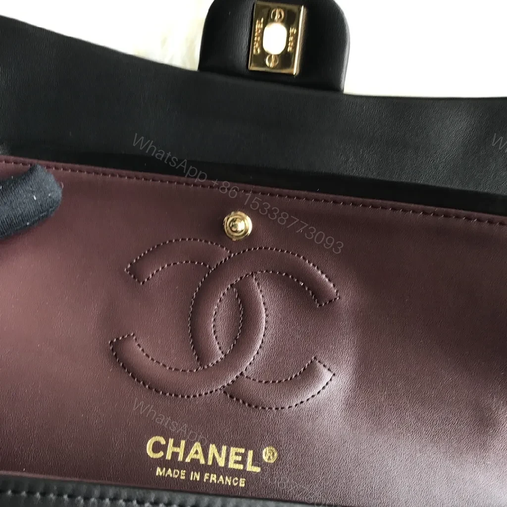 View 6 of Quilted Black Handbag with Gold Clasp – Luxe Chic Style