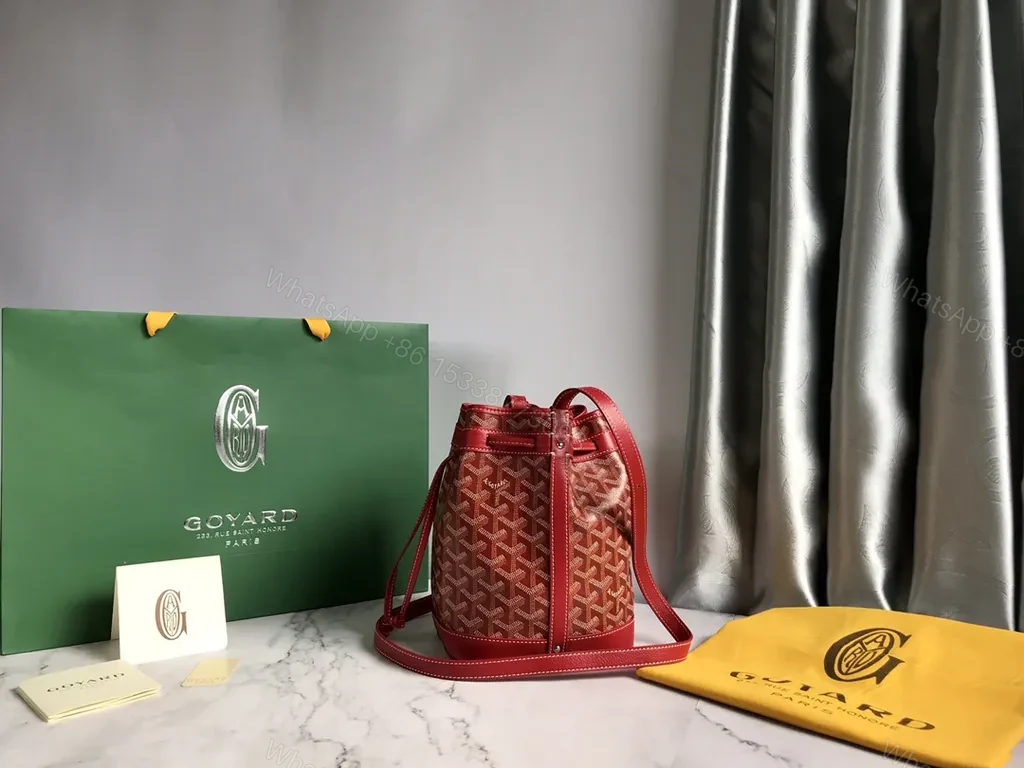Bold Goyardine Bucket Bag in Red Leather Trim — view 1