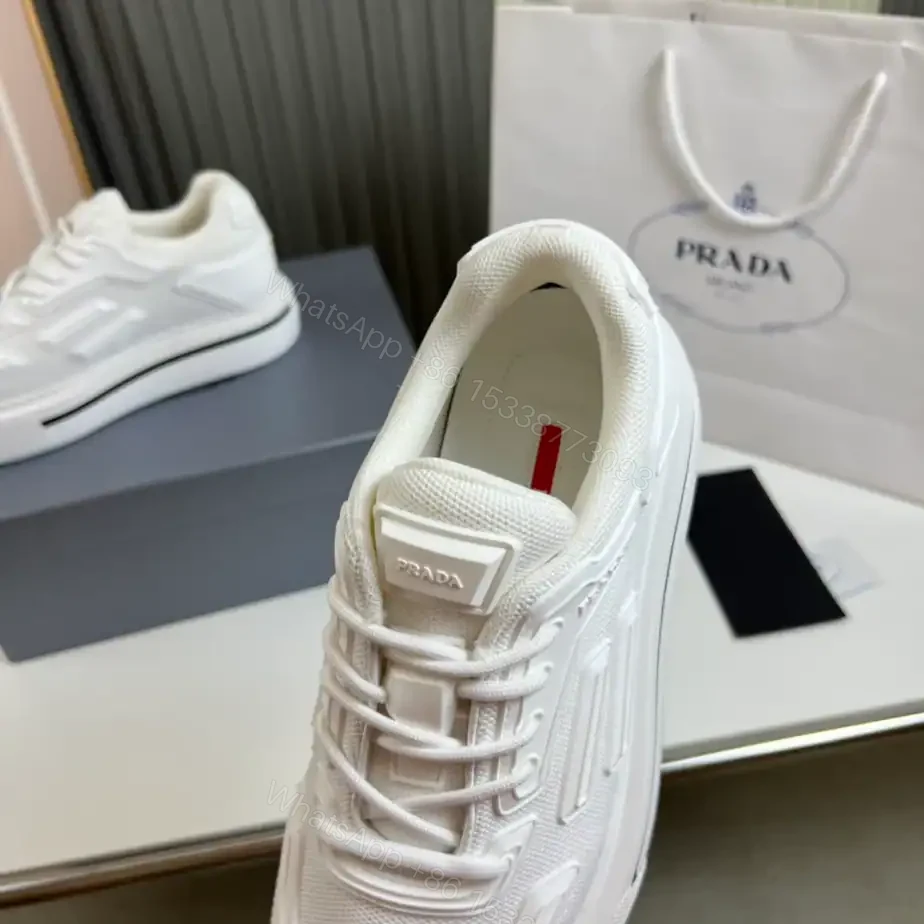 View 4 of PRADA MACRO RE-NYLON AND BRUSHED LEATHER SNEAKERS – PRD061