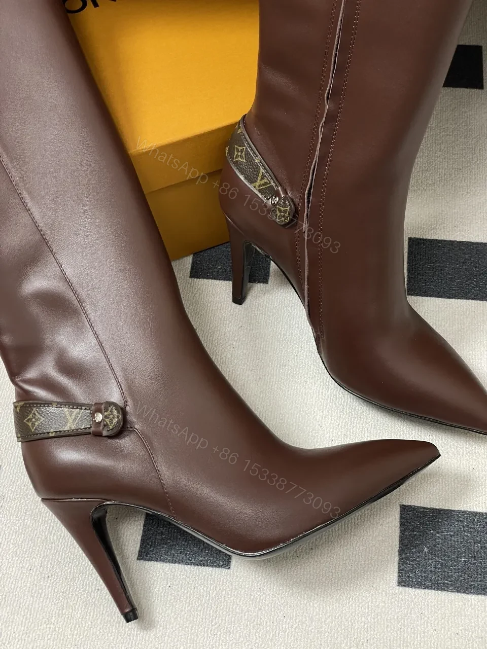 View 8 of Brown Leather Knee-High Boots with LV-Accent Details