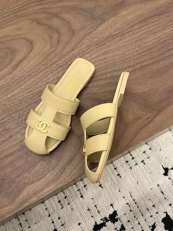 Beige Leather Slide Sandals with Chanel Logo, Flat Heel — view 1