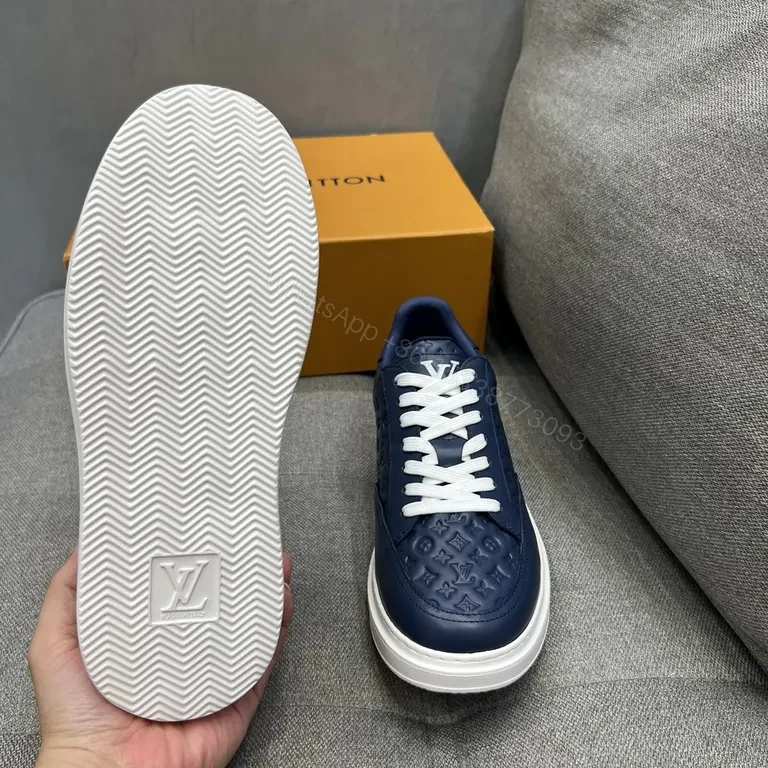View 7 of Navy Leather LV-Patterned Low-Top Sneakers â€” Modern Luxury