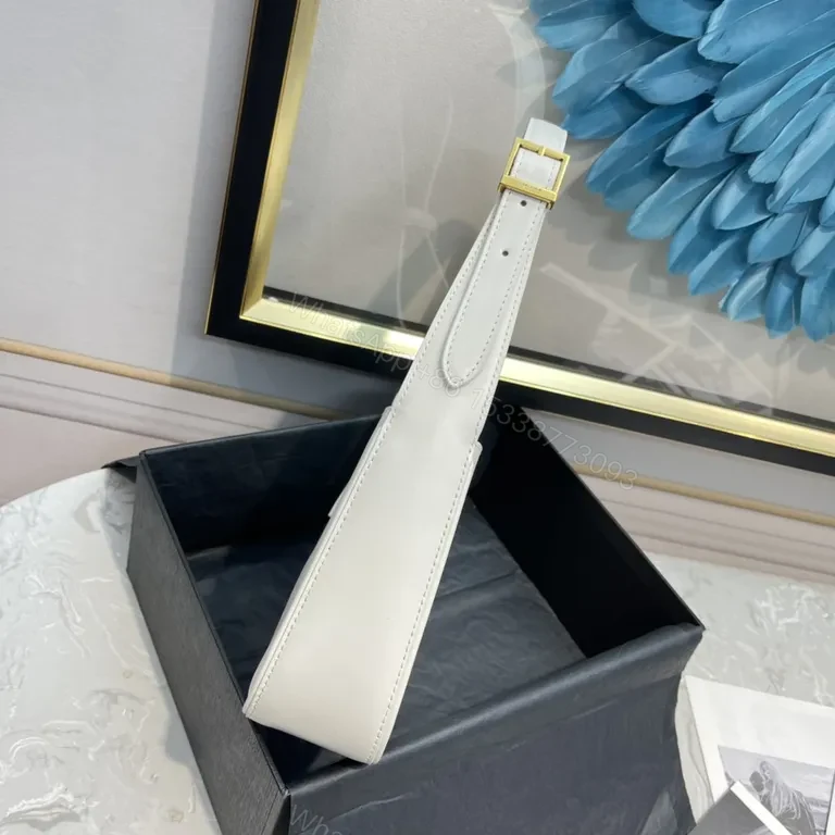 View 7 of Minimalist White Leather Handbag with Gold YSL Accent
