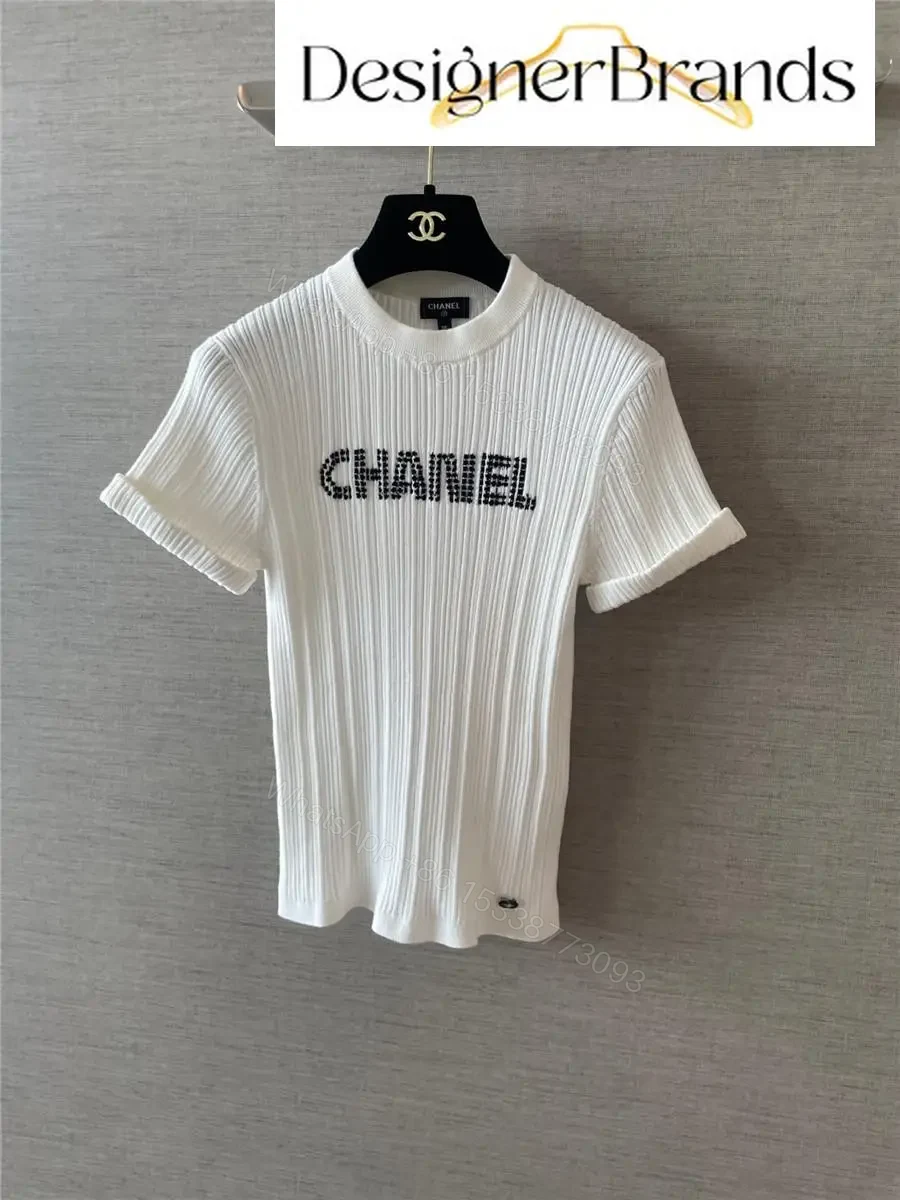 White Knit Tee with Logo Embellishment – Elevated Texture, Modern Luxury — view 1